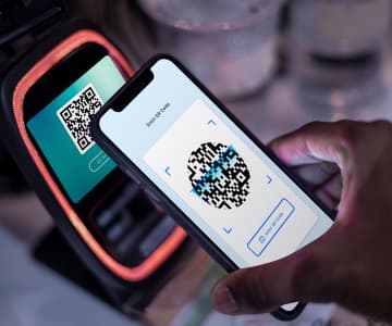 Man pays using his cell phone